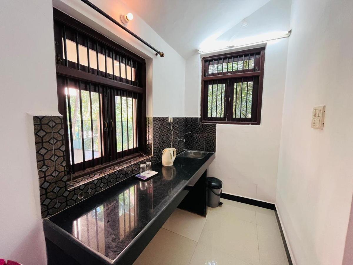 Naga Cottages Morjim Luaran gambar