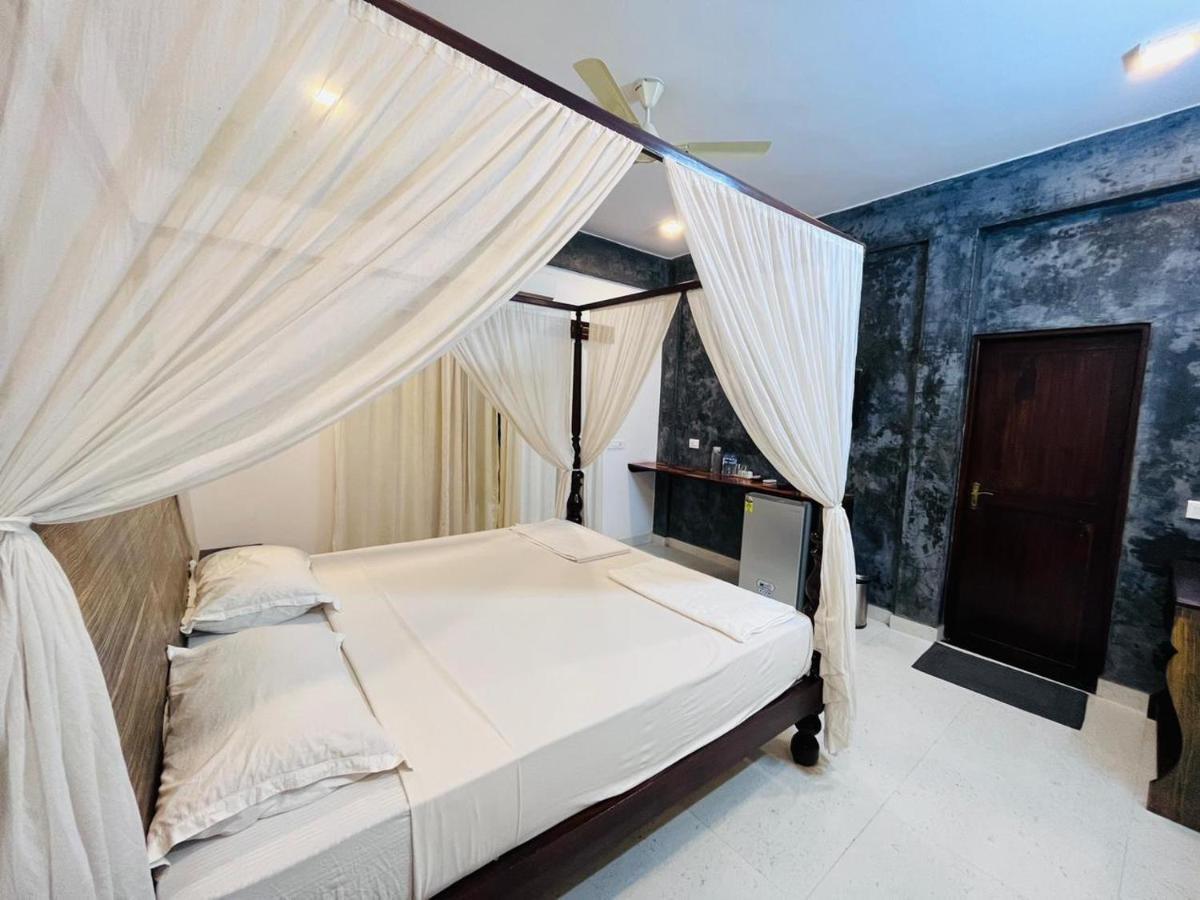 Naga Cottages Morjim Luaran gambar