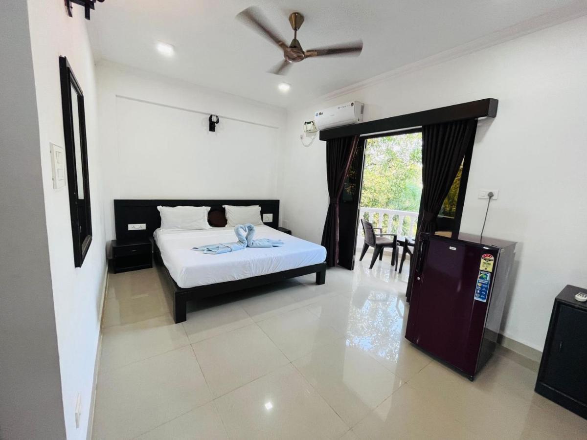Naga Cottages Morjim Luaran gambar