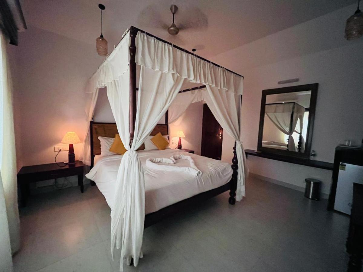 Naga Cottages Morjim Luaran gambar