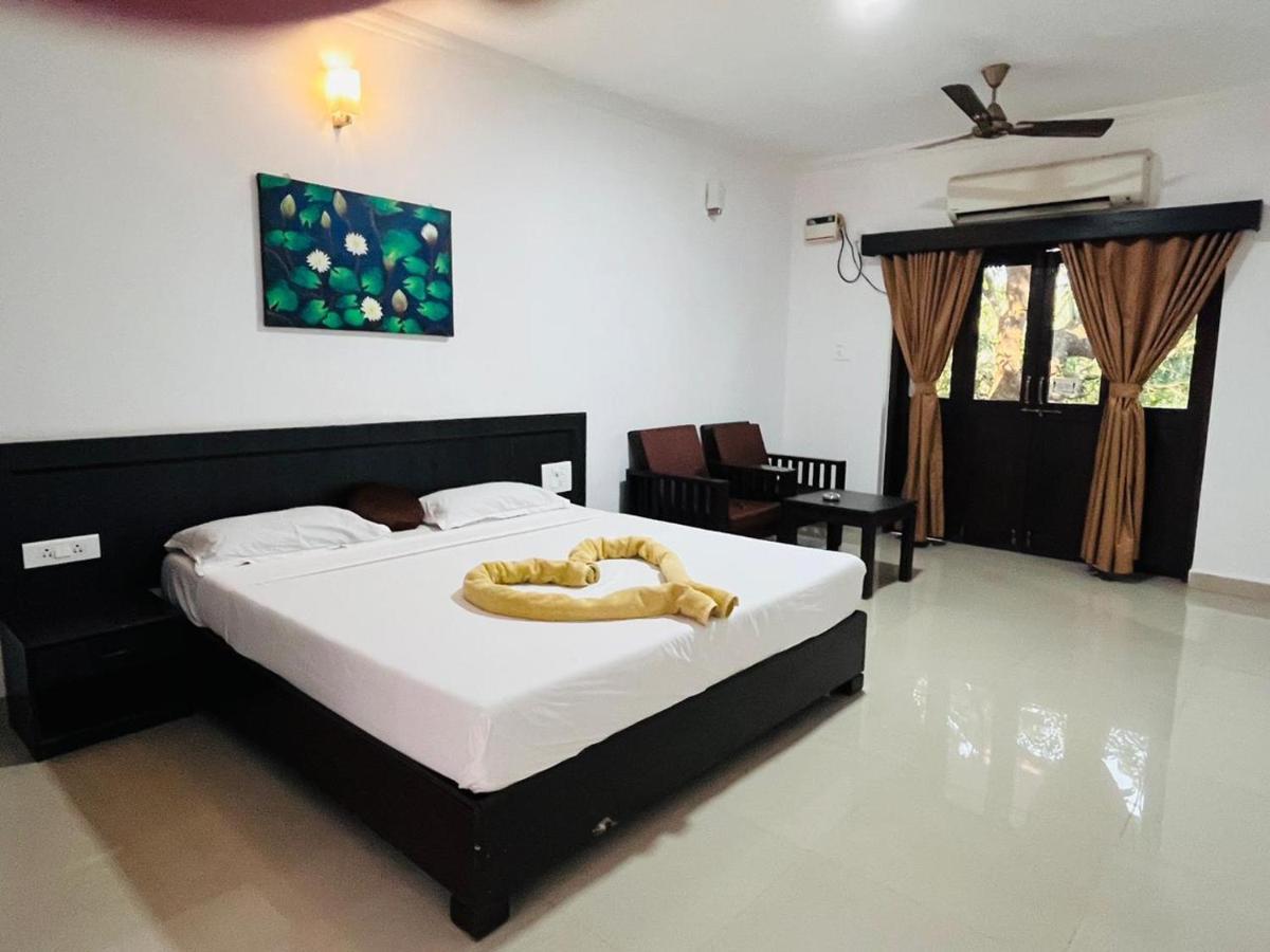 Naga Cottages Morjim Luaran gambar